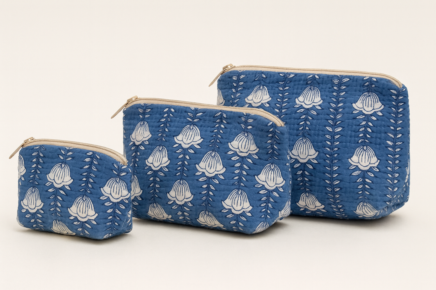 Blue Blooms Cosmetic Bag tote trio in quilted fabric with white floral pattern Erin Donahue Tice on Tampa Home & Garden Store