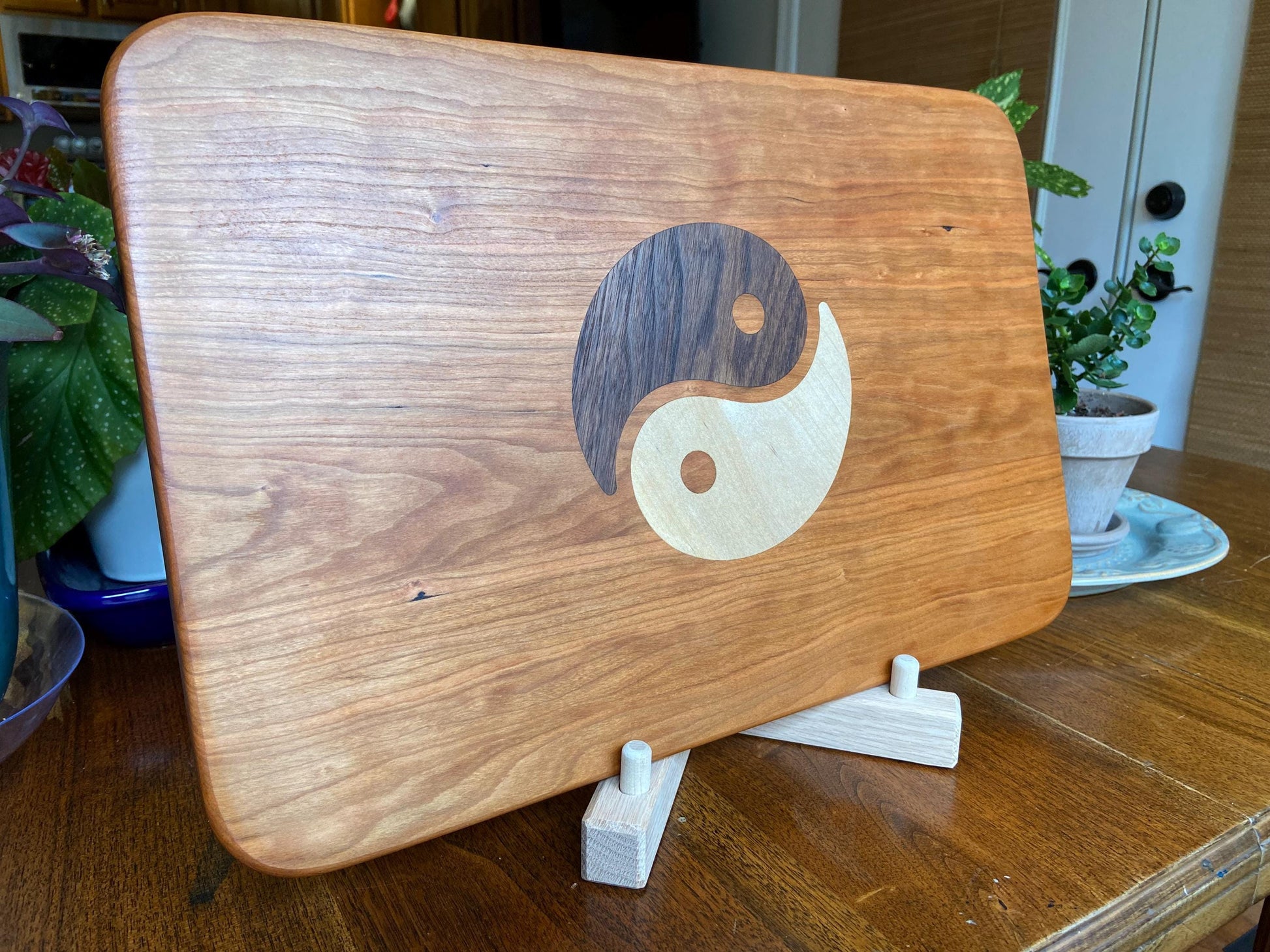 Cherry charcuterie board with Yin Yang inlay made from Peruvian Walnut and Maple. - Tampa Home & Garden Store