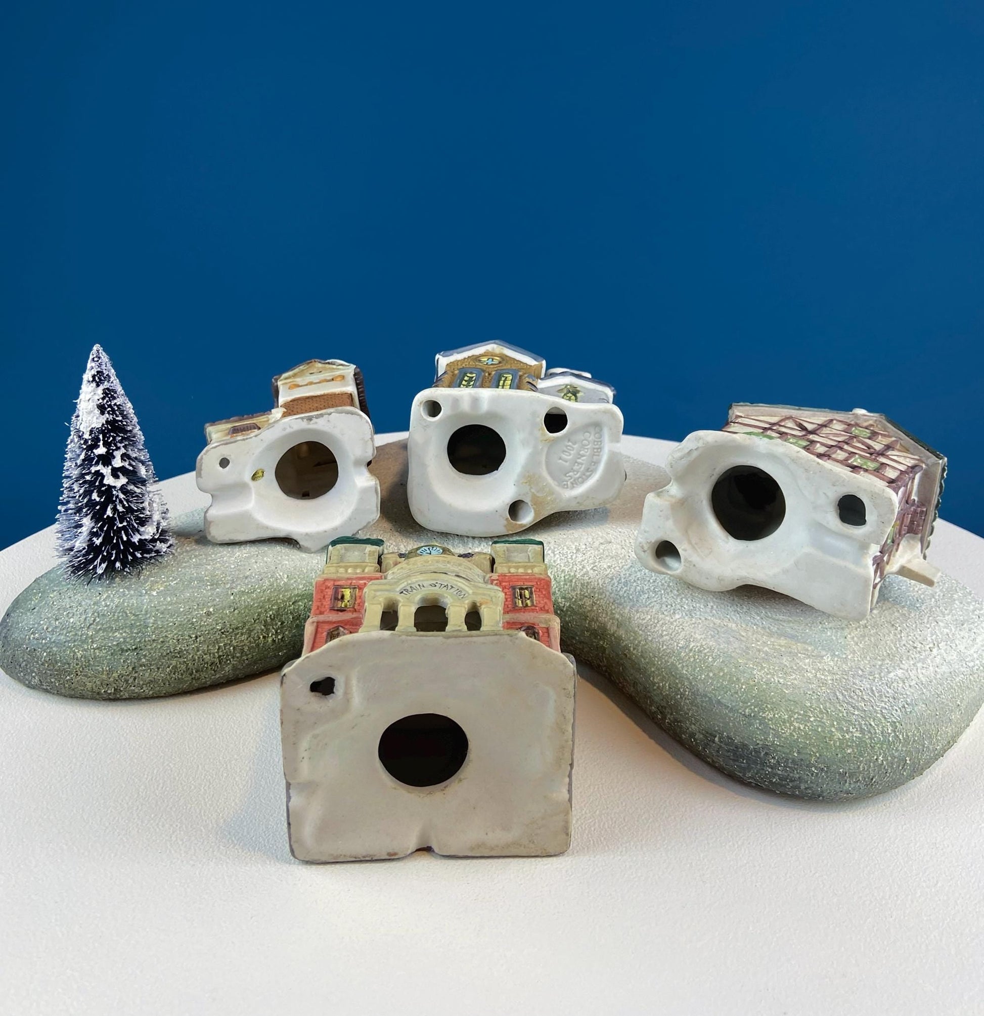 Christmas Village Collection of Small Illuminated Houses. Set of 4 Bldgs: Mill, 2 Churches, Train St., Council Offices, 2 Sheep and 3 Pines. - Tampa Home & Garden Store