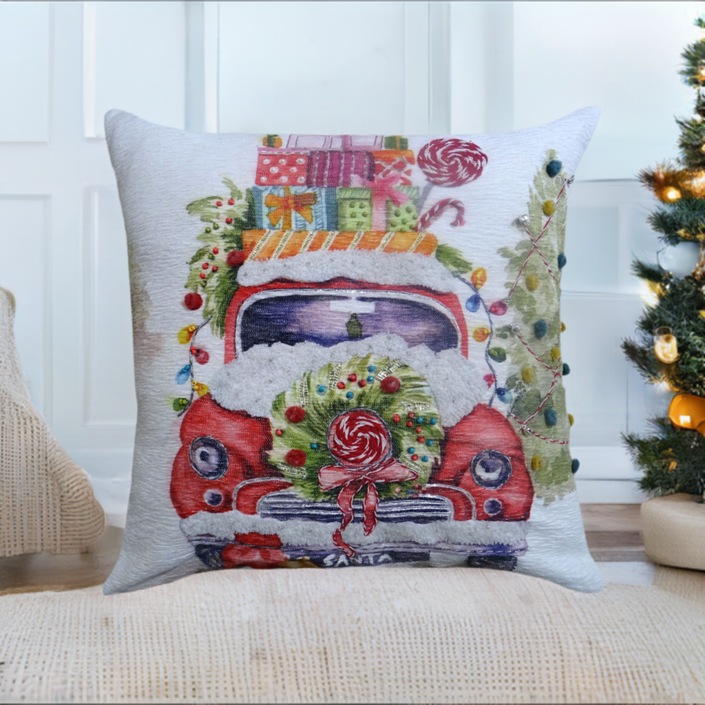 Vibhsa Christmas Embroidered Throw Pillow 20x20 white with a red truck motif and gifts on Tampa Home & Garden Store
