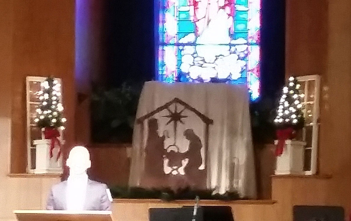 Nativity Scene Outdoor Christmas decor Rustica Ornamentals silhouetted holy family under a star on brown draped backdrop on Tampa Home & Garden Store