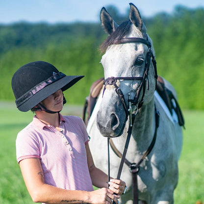 EquiVisor Glitz Sun Protection sun visor in black with glitter band worn by rider beside horse on Tampa Home & Garden Store