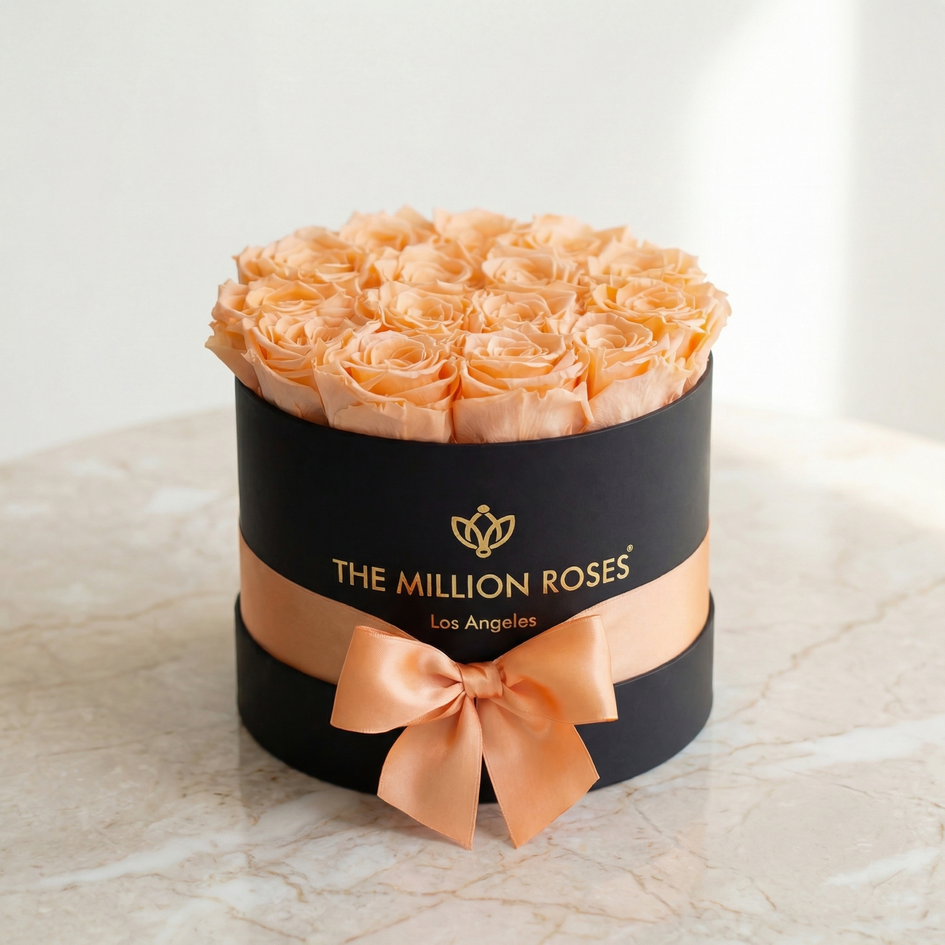 Classic Black Box filled with peach roses by The Million Roses on Tampa Home & Garden Store