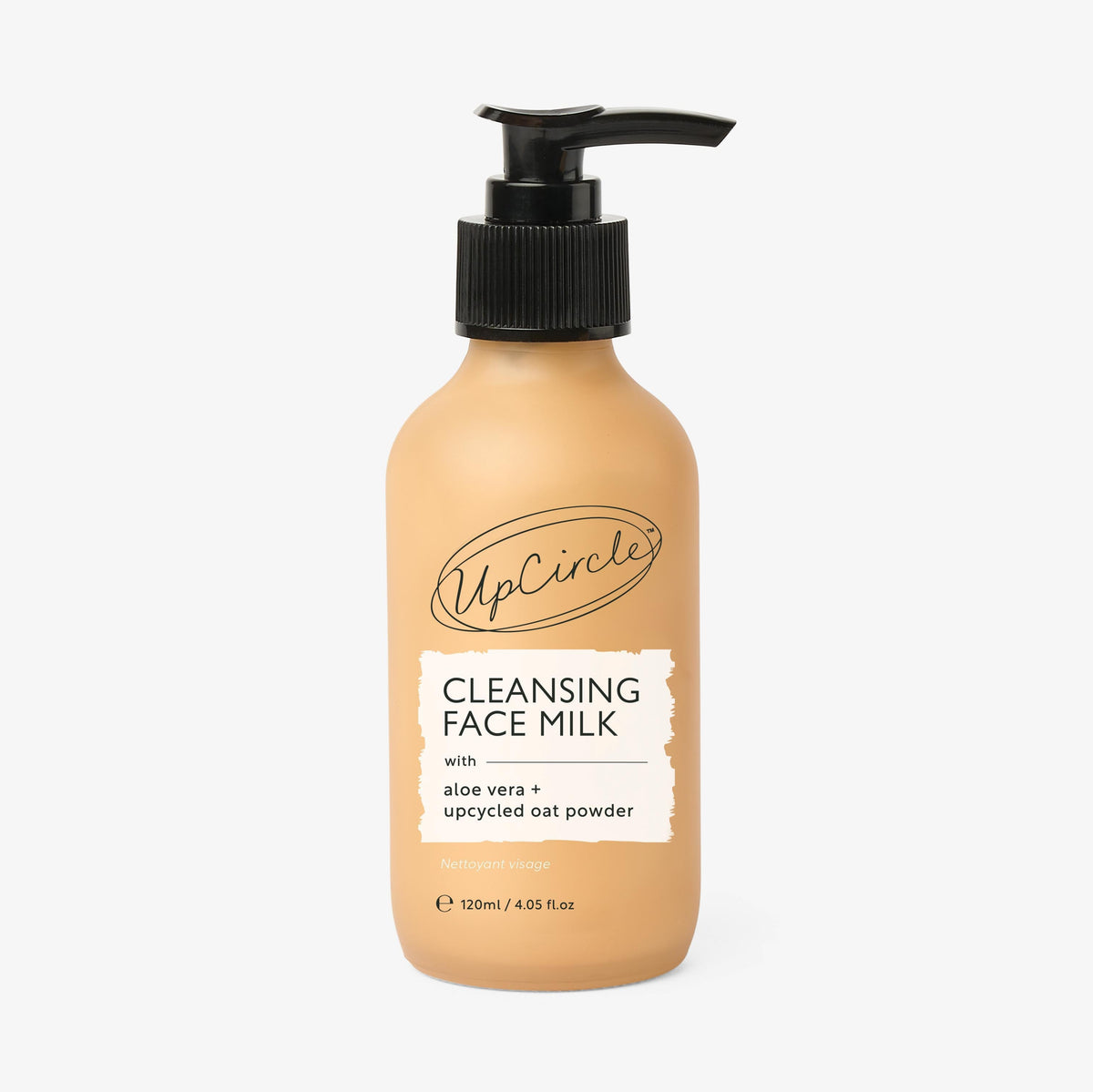 UpCircle Cleansing Face Milk bottle with black pump on tan label showing oat powder and aloe vera on Tampa Home & Garden Store