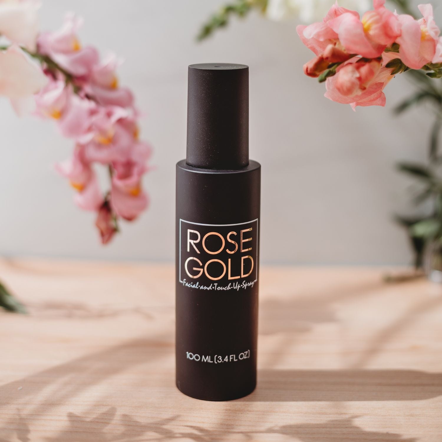 Facial Tanning Mist - Clear Tanning Water in a matte black spray bottle with Rose Gold Sunless on Tampa Home & Garden Store