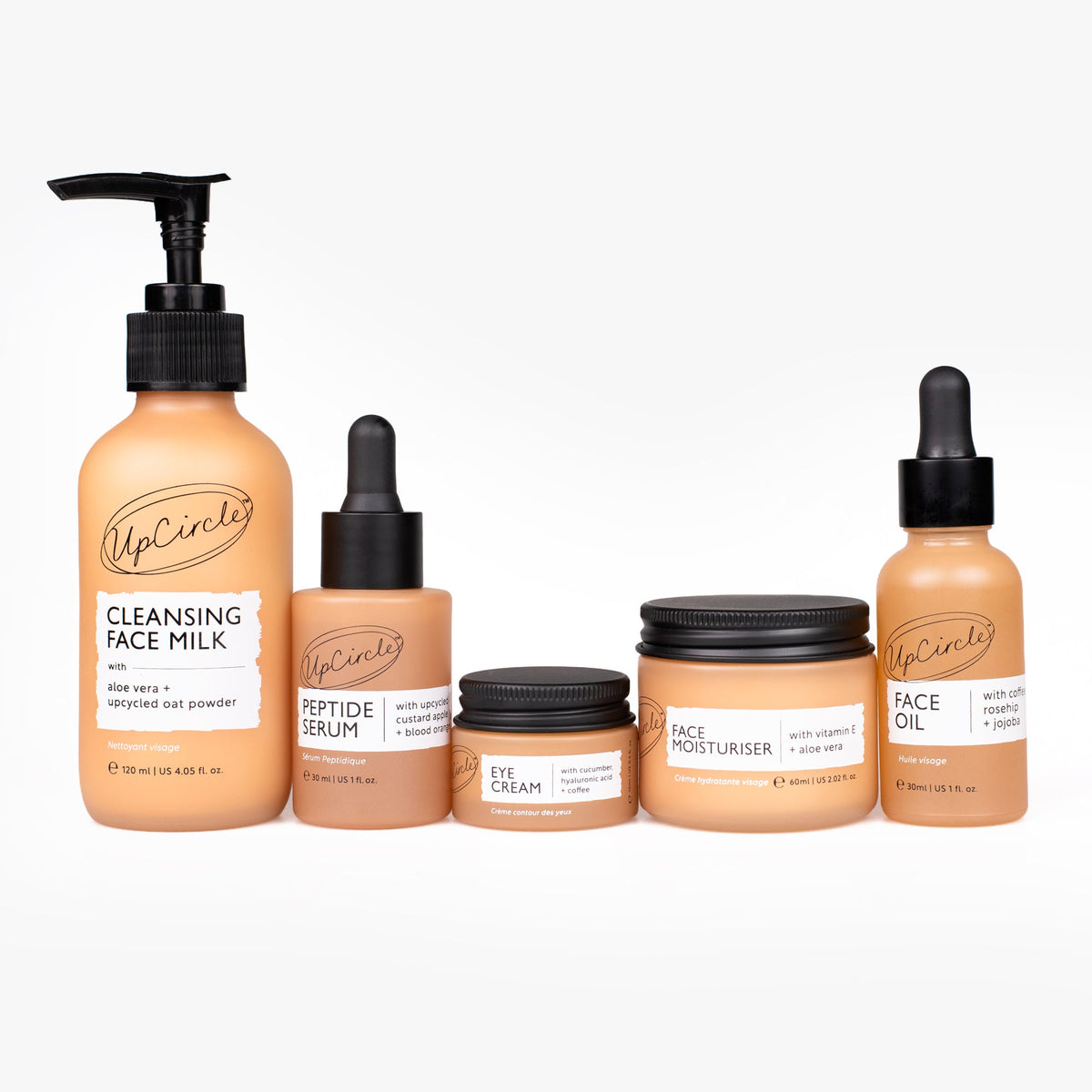 UpCircle 5-Step Bundle: five peach bottles with cleansing milk, peptide serum, eye cream on Tampa Home & Garden Store
