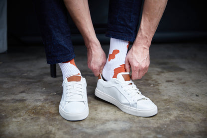CiderOrange DeadSoxy crew socks 4-pack white with orange cow-print accents on Tampa Home & Garden Store