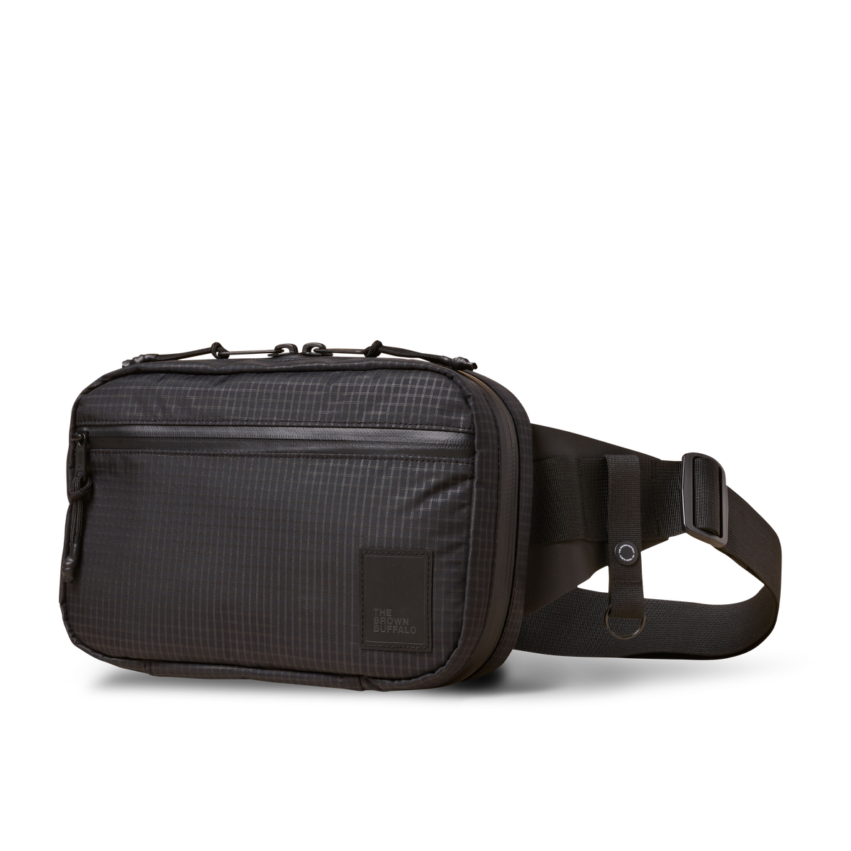 Concealsling crossbody bag by The Brown Buffalo in dark gray grid fabric with logo patch on Tampa Home & Garden Store