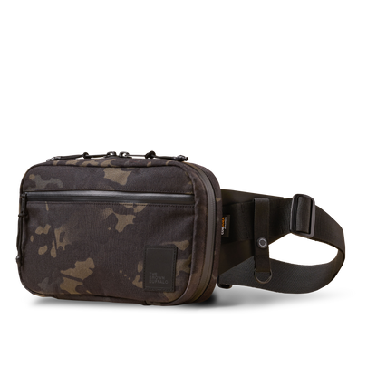 Concealsling camouflage crossbody bag by The Brown Buffalo with front zip pocket and strap on Tampa Home & Garden Store