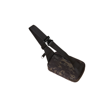 Concealsling crossbody bag by The Brown Buffalo with black strap and camo fabric body on Tampa Home & Garden Store