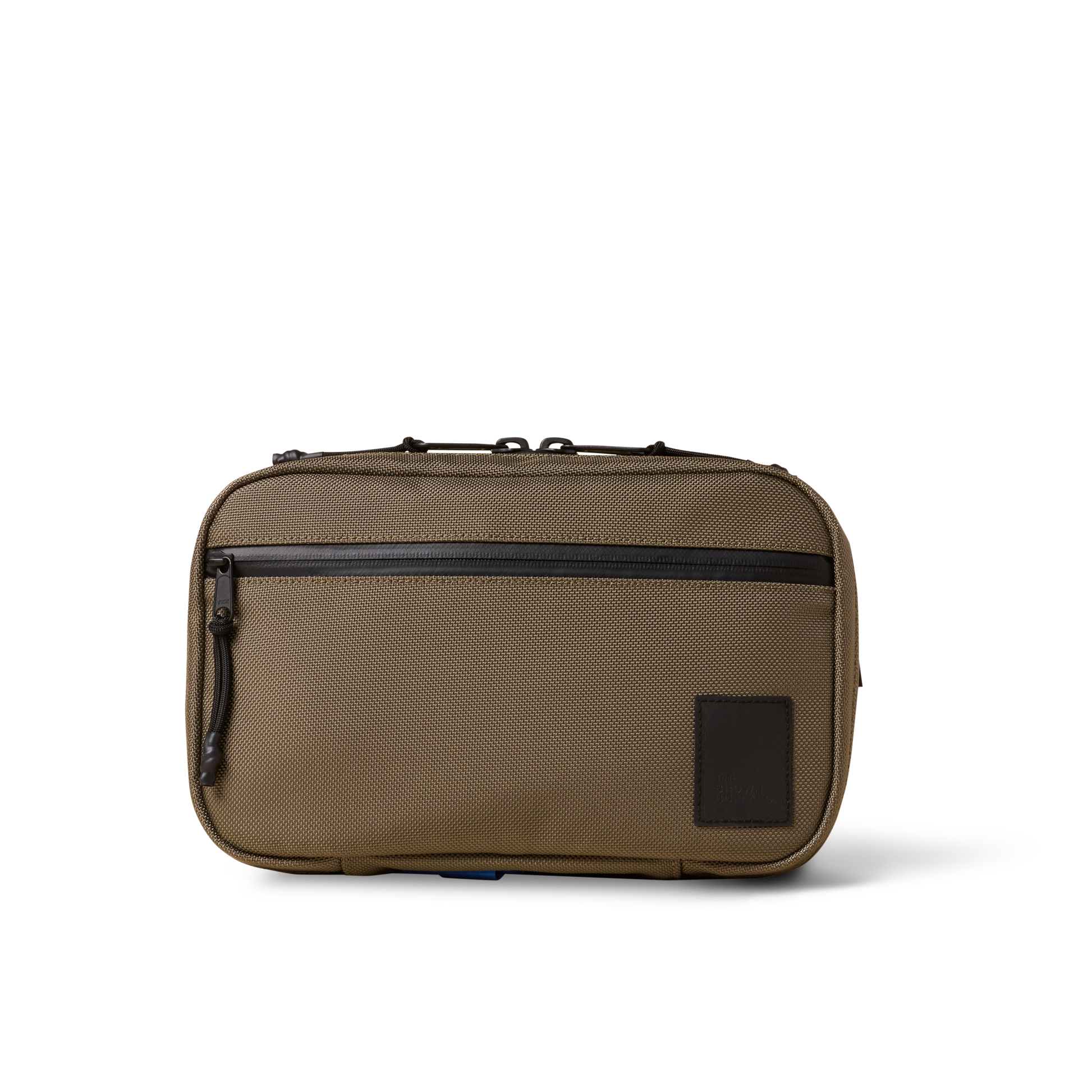 Concealsling crossbody bag by The Brown Buffalo in brown canvas with front zip pocket on Tampa Home & Garden Store