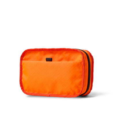Concealsling crossbody bag by The Brown Buffalo in bright orange fabric with black zipper on Tampa Home & Garden Store