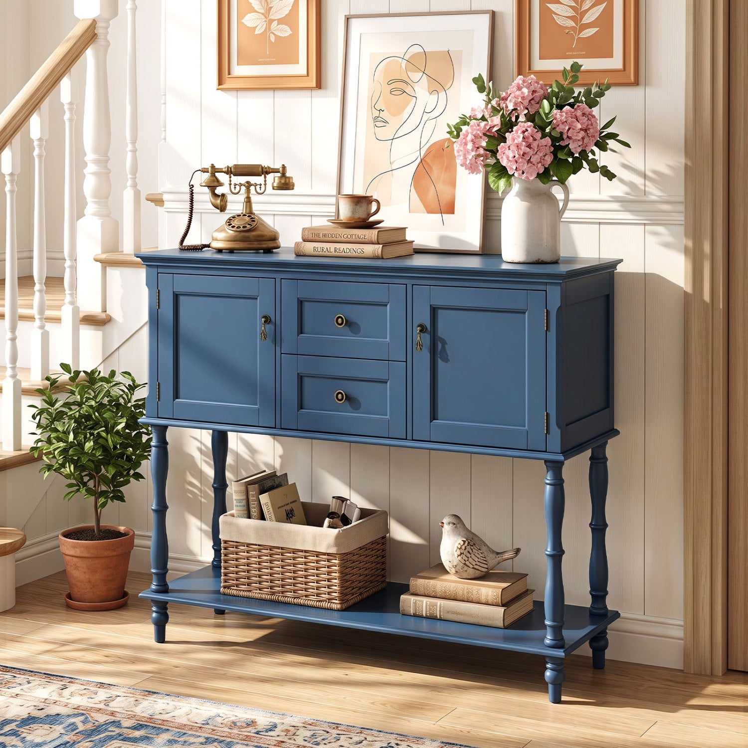 Console table in blue with 2 drawers and cabinets, hardware, paired with phone and pink vase on Tampa Home & Garden Store
