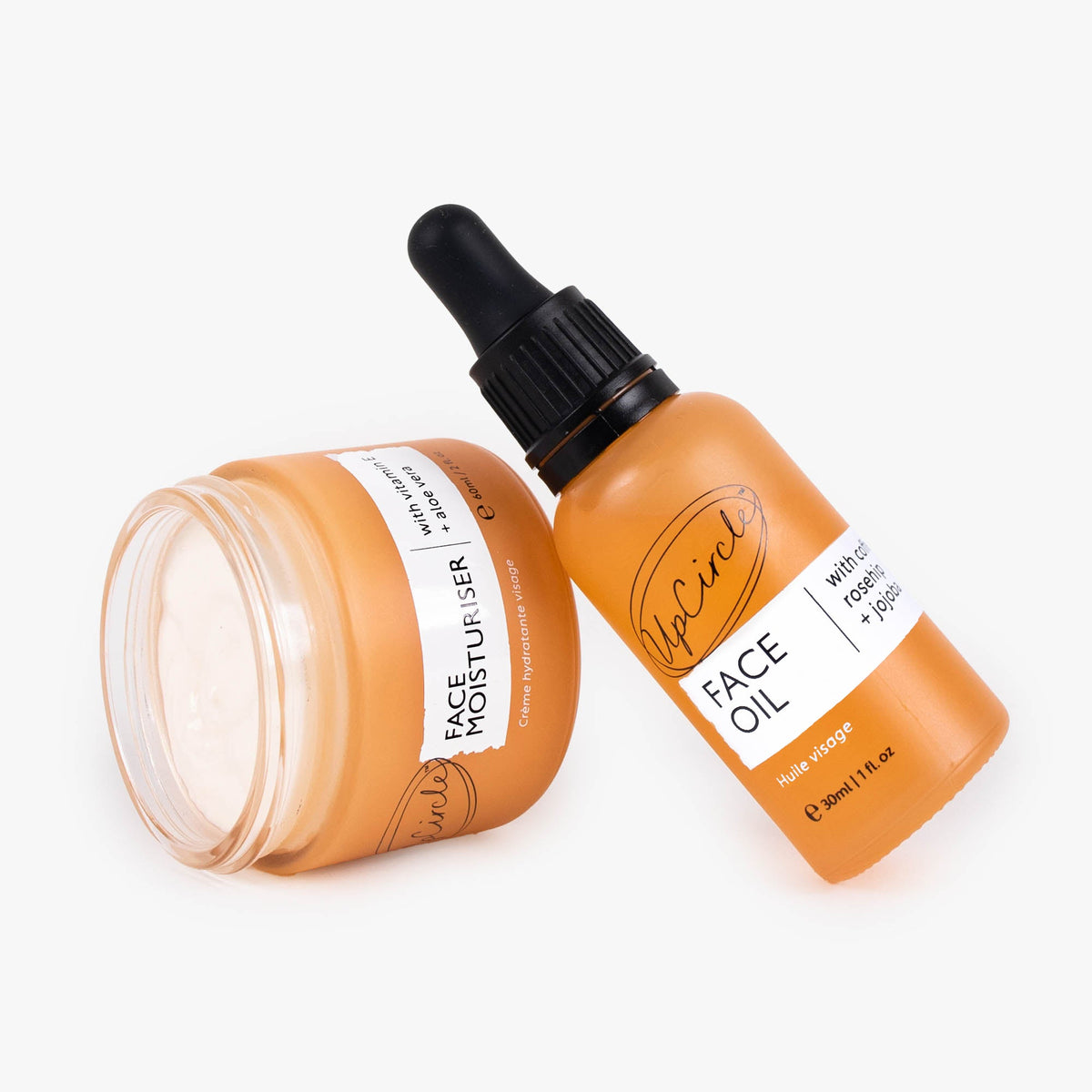 UpCircle Hydration Skincare Set: two amber glass face oil bottles with black droppers on Tampa Home & Garden Store