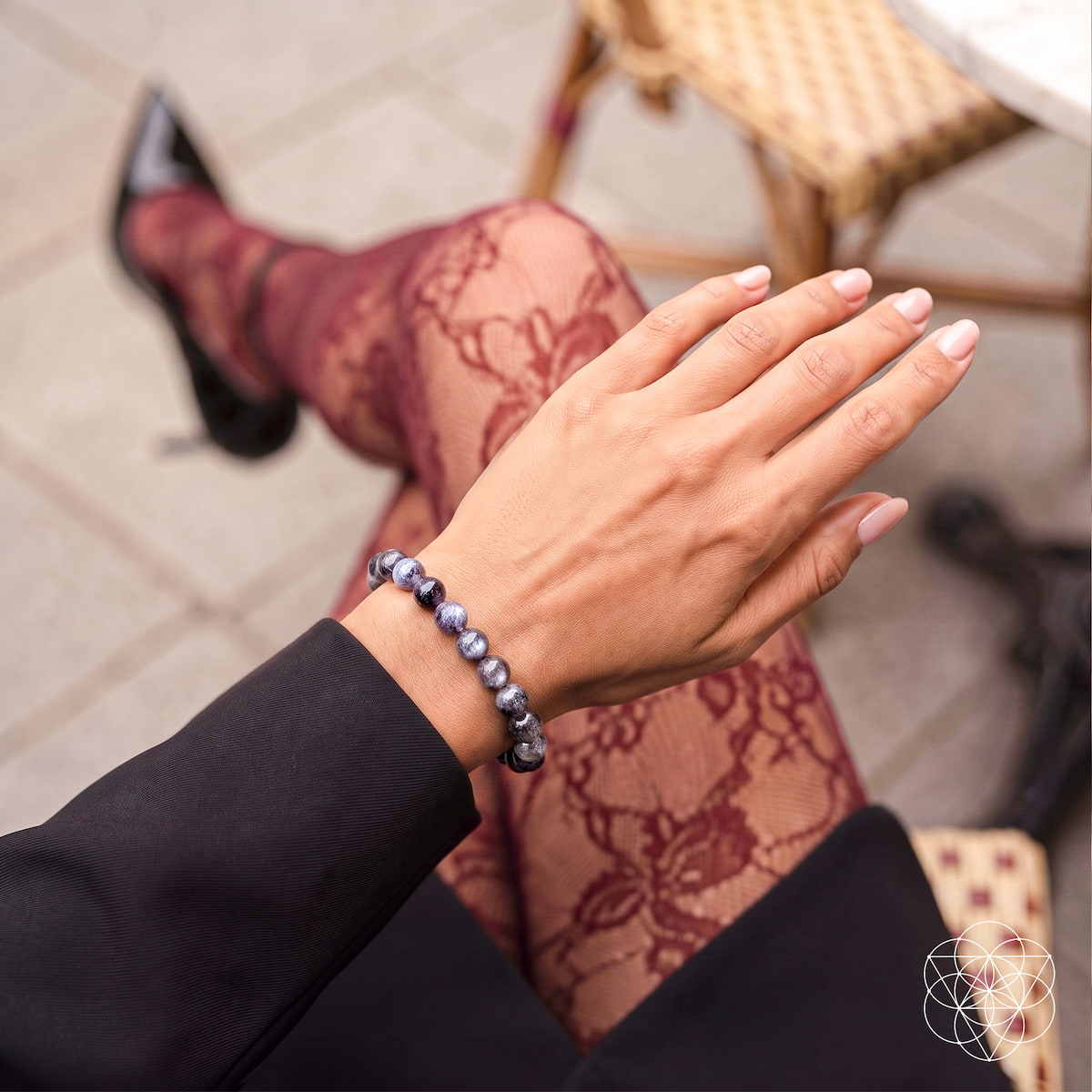 Empath Cord Cutter Black Moonstone bracelet by Conscious Items on wrist with lace dress on Tampa Home & Garden Store