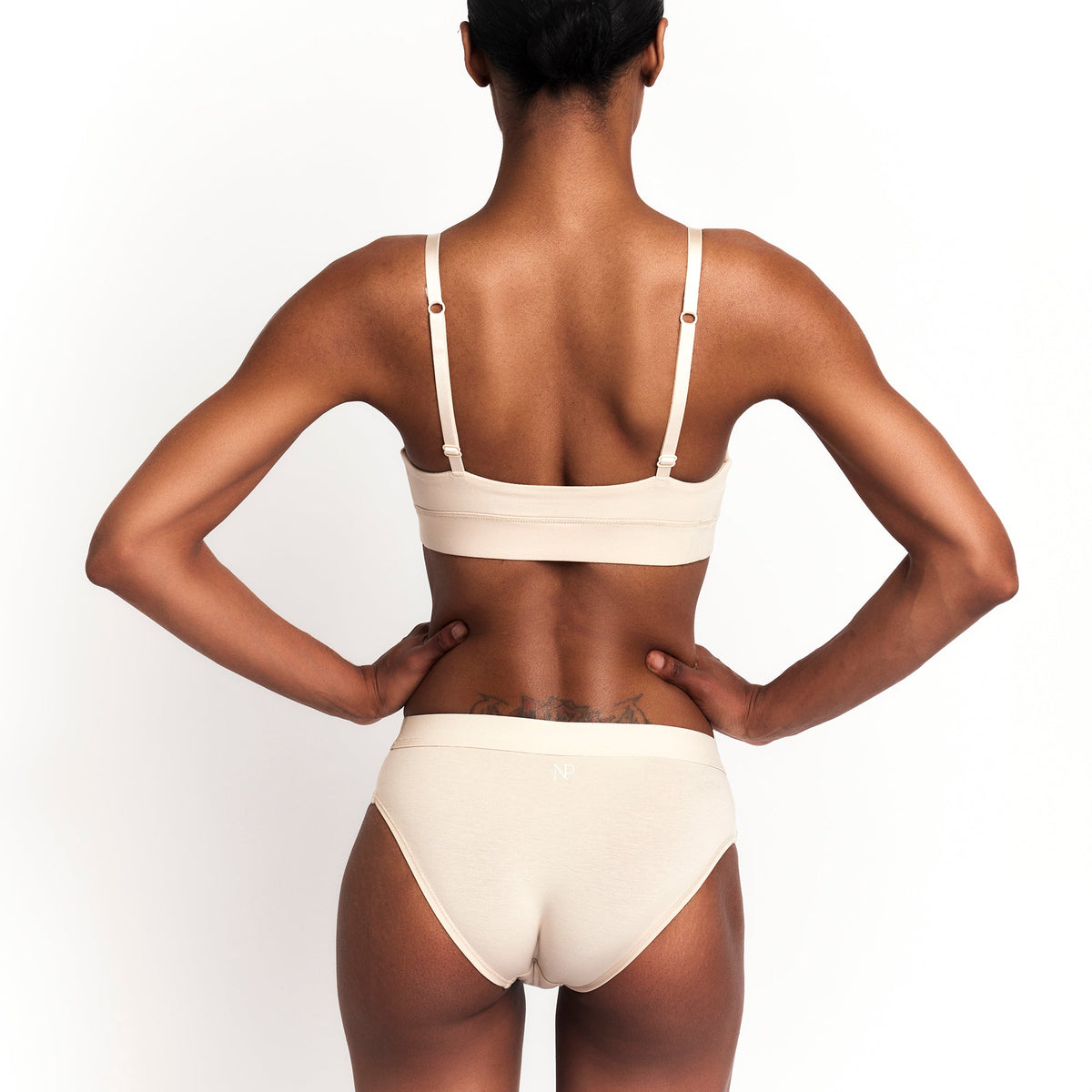 Mid-Rise Brief in organic cotton beige with Net Positive logo on back waistband on Tampa Home & Garden Store