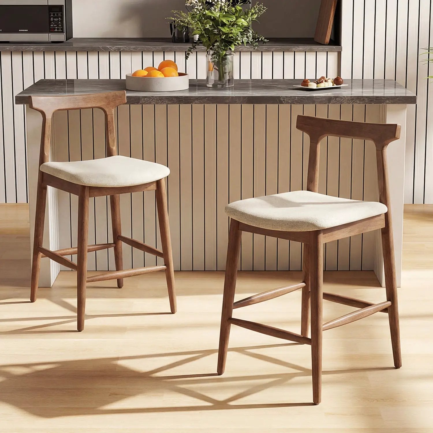 Pair of 24-inch solid wood counter height bar stools with curved backs in warm brown wood on Tampa Home & Garden Store