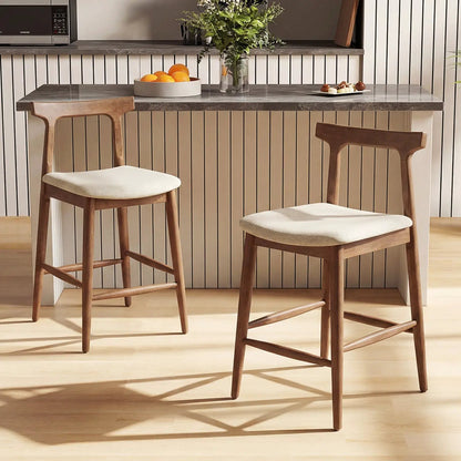 Pair of 24-inch solid wood counter height bar stools with curved backs in warm brown wood on Tampa Home & Garden Store