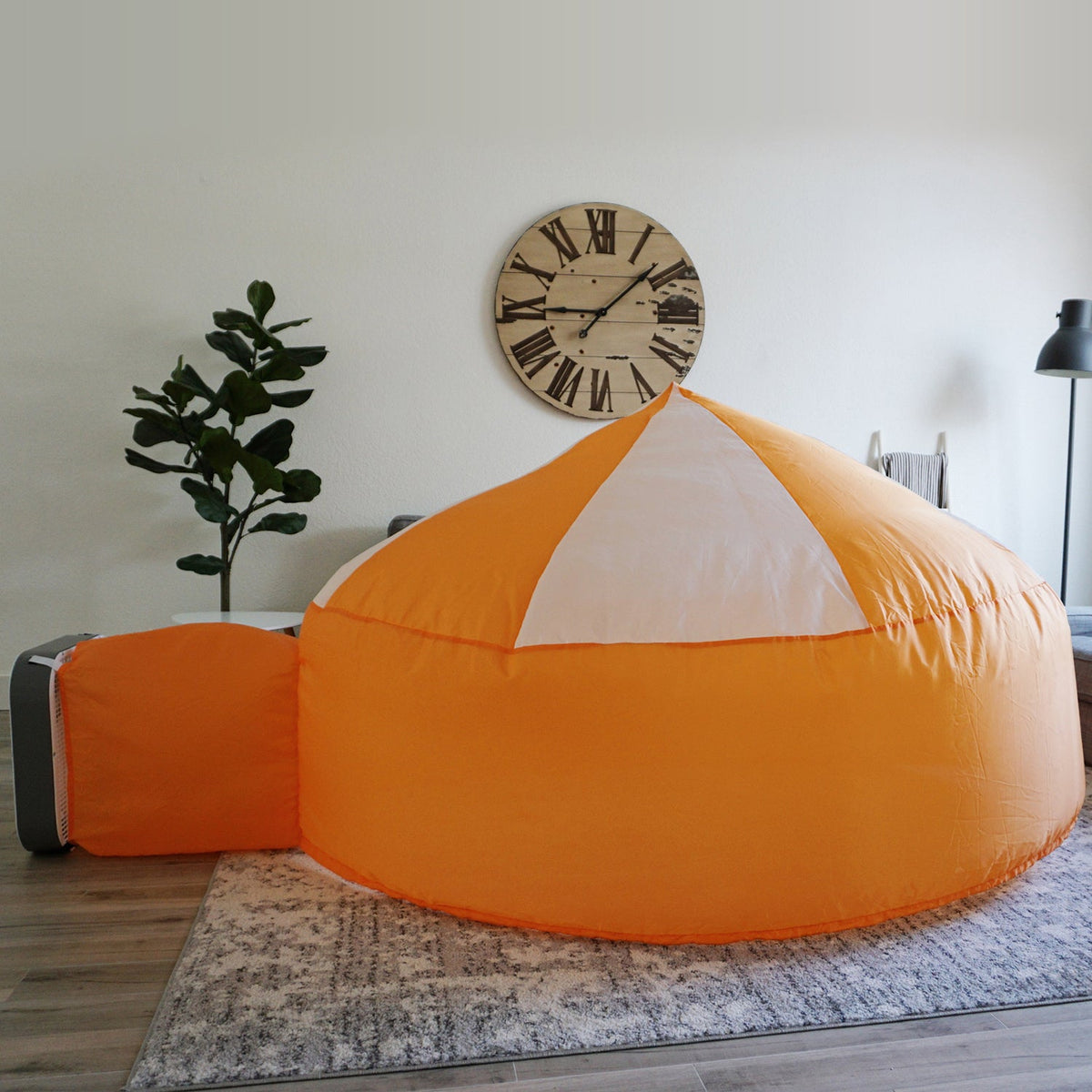 AirFort Creamsicle Orange Inflatable Kids Play Fort with white panels in living room on Tampa Home & Garden Store