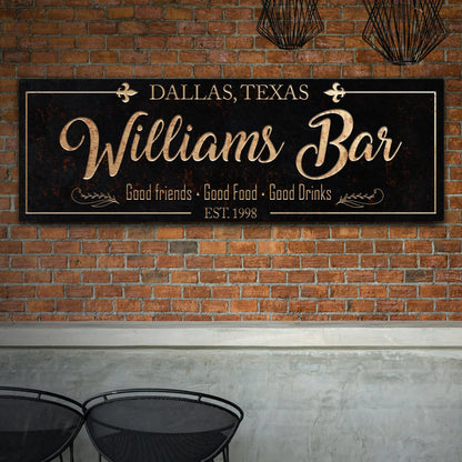 Custom Bar Sign Canvas, black with gold Williams Bar script on a brick wall, two black chairs on Tampa Home & Garden Store