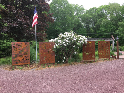 Rust-colored metal privacy panels by Rustica Ornamentals, floral cutouts, set of 4, 46 in on Tampa Home & Garden Store