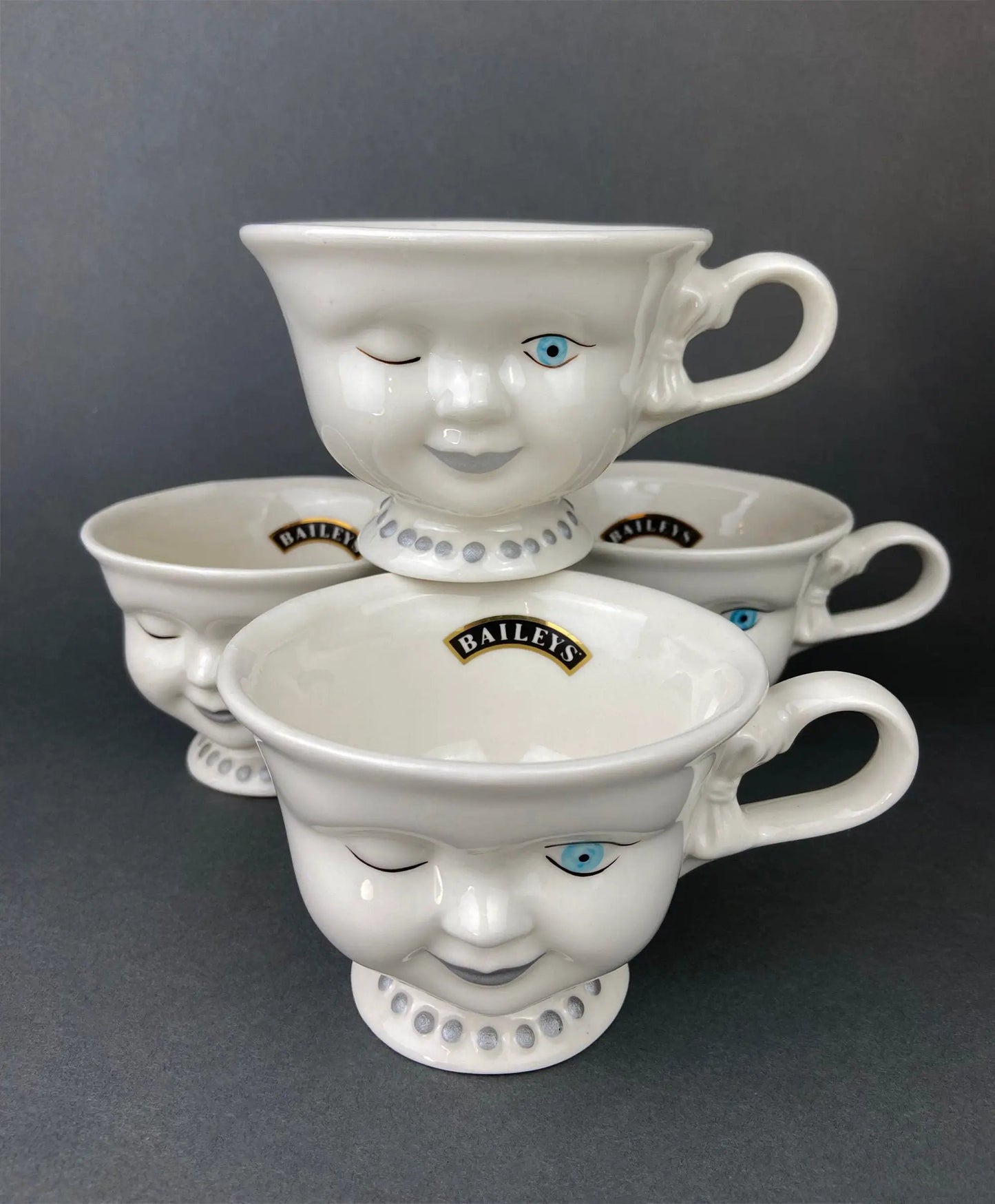 Cute bunny armchair sugar creamer trio, white ceramic bunny with blue eyes and Baileys logos on interior on Tampa Home & Garden Store