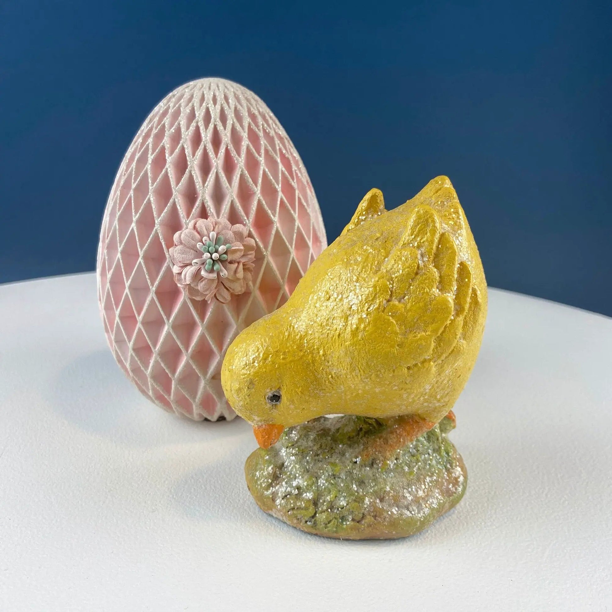 Cute Plump Yellow Baby Chick Figurine beside pink lattice egg for Easter decor on Tampa Home & Garden Store