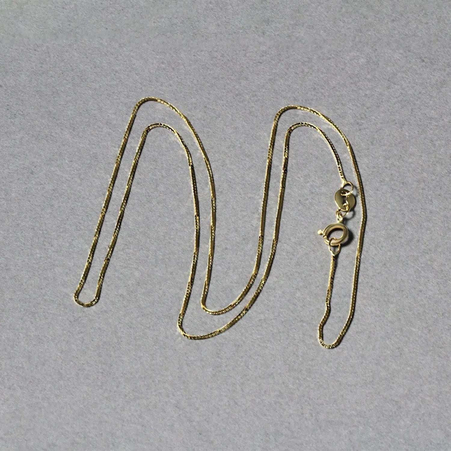 14k yellow gold box chain necklace 0.6mm with lobster clasp Bids.com on Tampa Home & Garden Store