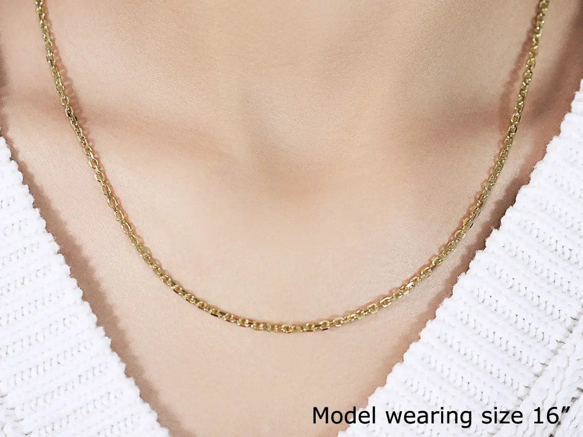 2.6mm yellow gold diamond-cut cable link necklace on model's neck, 16 inch length on Tampa Home & Garden Store