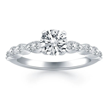 Engagement ring in 14k white gold with round center diamond and pavé diamonds on a twisted band on Tampa Home & Garden Store