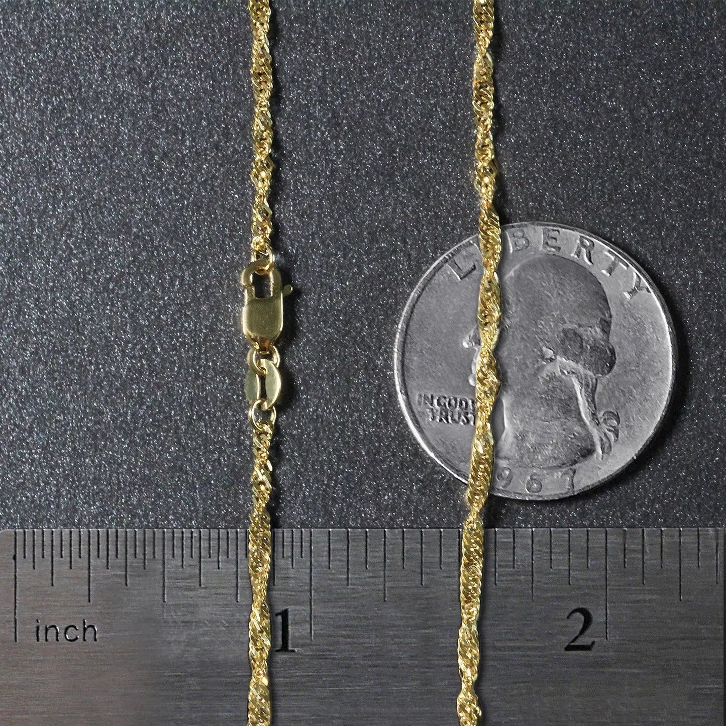 10k yellow gold Singapore chain necklace 1.80mm with lobster clasp by Bids.com beside a dime for scale on Tampa Home & Garden Store