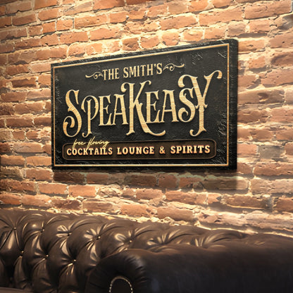 Speakeasy bar sign canvas with black textured surface and gold lettering on brick wall on Tampa Home & Garden Store