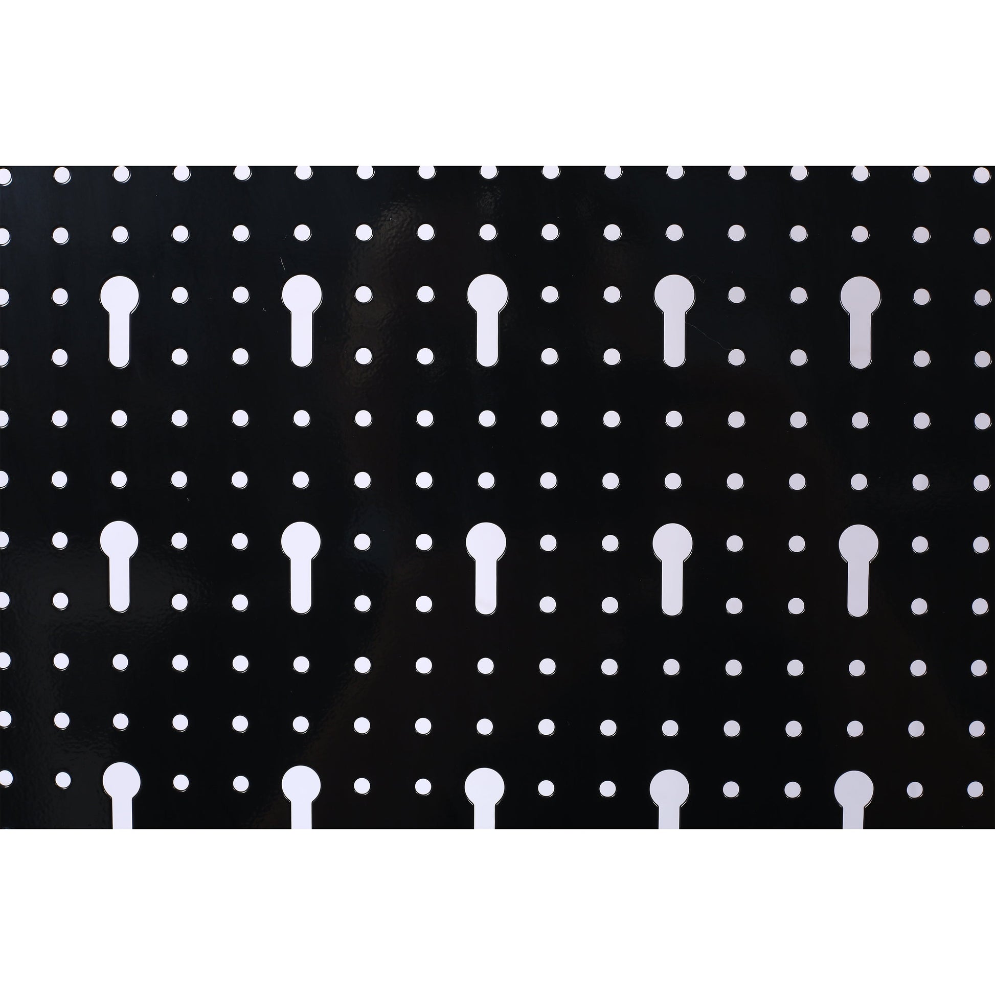 Black metal pegboard panel with white holes and keyhole slots for tool storage on Tampa Home & Garden Store