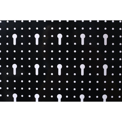 Black metal pegboard panel with white holes and keyhole slots for tool storage on Tampa Home & Garden Store
