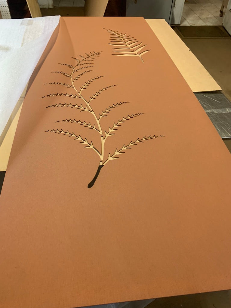 Outdoor metal privacy panel by Rustica Ornamentals in rust-brown steel with tree cutouts on Tampa Home & Garden Store
