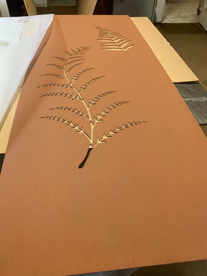 Outdoor metal privacy panel by Rustica Ornamentals in rust-brown steel with tree cutouts on Tampa Home & Garden Store