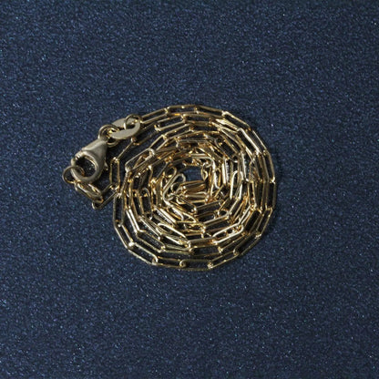 14K yellow gold paperclip chain necklace 1.5mm by Bids.com with lobster clasp, coiled display on Tampa Home & Garden Store