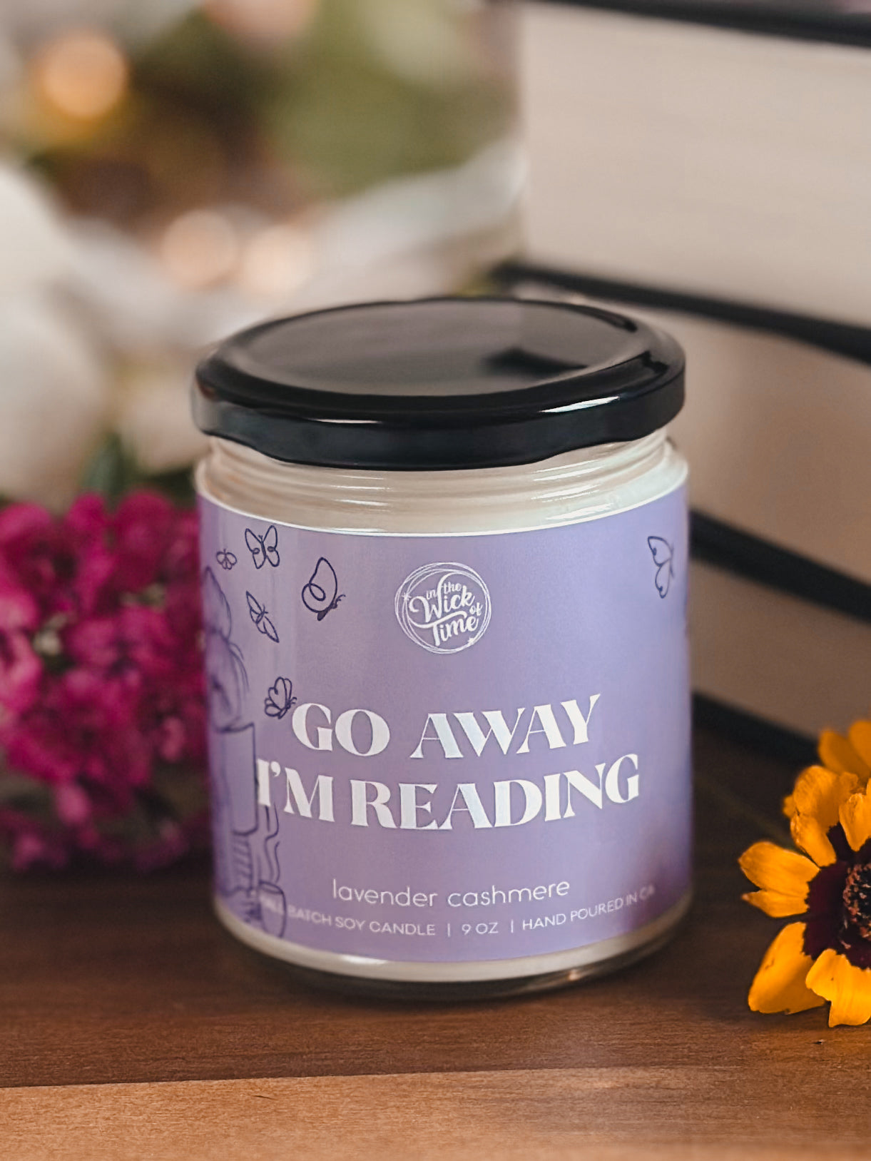 Go Away I'm Reading candle by In the Wick of Time, lavender cashmere 9 oz jar with purple label on Tampa Home & Garden Store