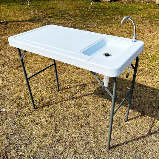 Outdoor fish and game cutting table with sink, white plastic top, chrome faucet, folding legs on Tampa Home & Garden Store