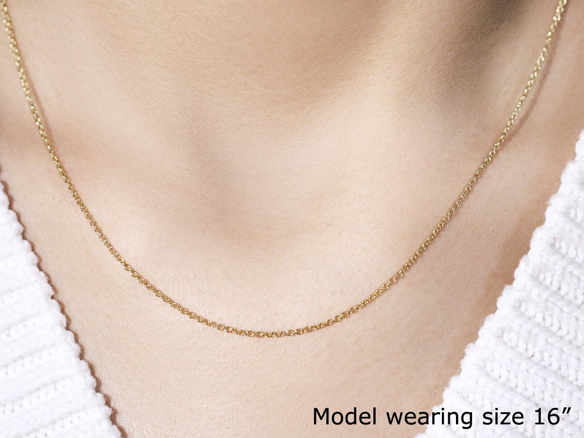 14k yellow gold round cable link necklace 1.3mm by Bids.com worn by model on Tampa Home & Garden Store