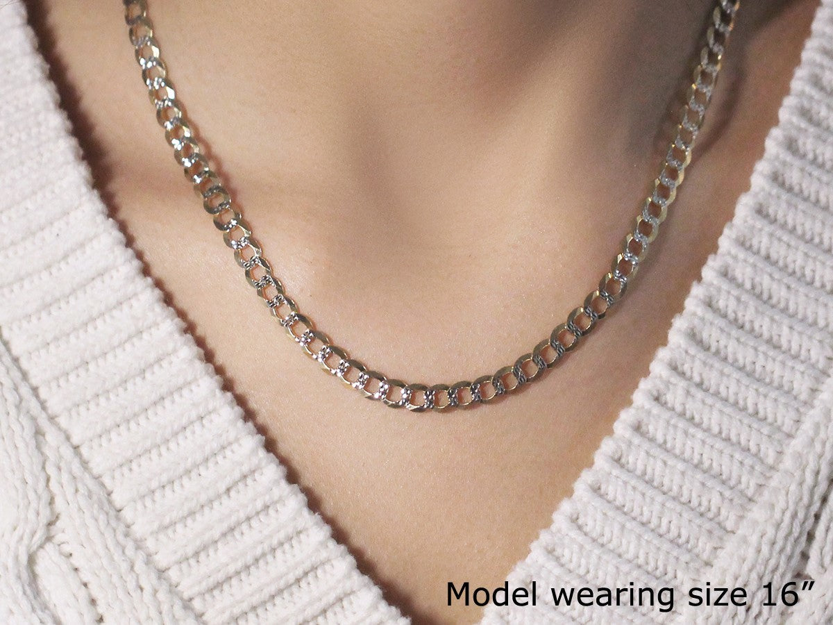 5.7mm two-tone gold pave curb chain necklace on model's neck on Tampa Home & Garden Store