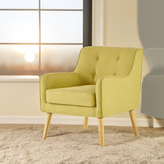 Yellow fabric arm chair with tufted back and wooden legs in sunlit living room on Tampa Home & Garden Store