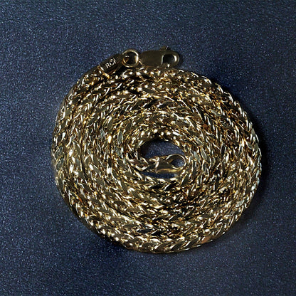 3.15mm 14k yellow gold diamond-cut round Franco chain necklace, coiled on Tampa Home & Garden Store