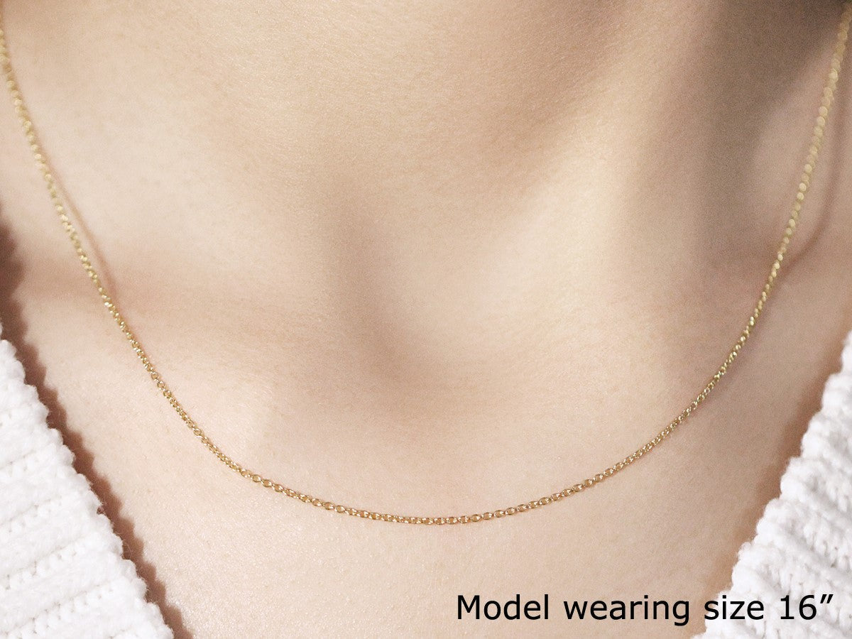 14k yellow gold round cable link necklace 1.1mm on model wearing size 16 on Tampa Home & Garden Store