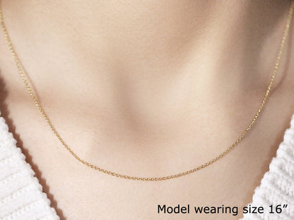 14k yellow gold round cable link necklace 1.1mm on model wearing size 16 on Tampa Home & Garden Store