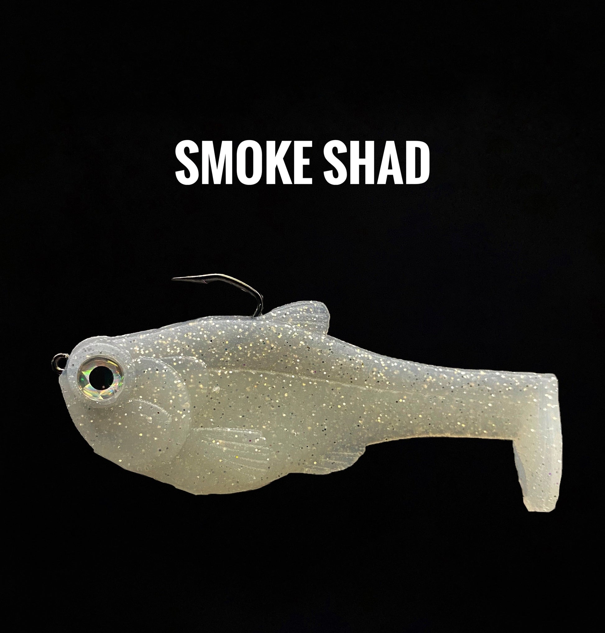 4.5in Nacho boot-tail soft swimbait by Bull Shad in Smoke Shad, translucent glitter body on Tampa Home & Garden Store
