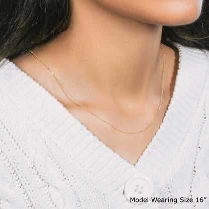 10k yellow gold diamond-cut cable link chain necklace 0.87 mm on white knit sweater on Tampa Home & Garden Store