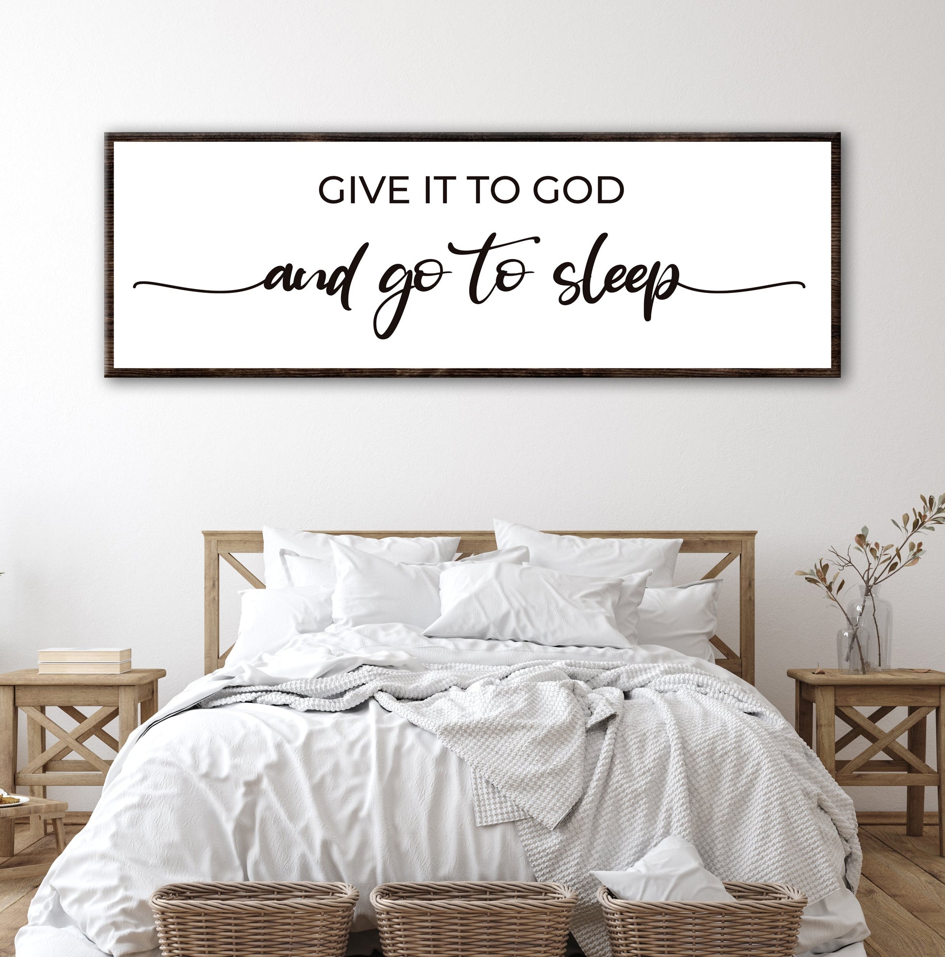 Tailored Canvases sign, white with black text in dark wood frame on Tampa Home & Garden Store