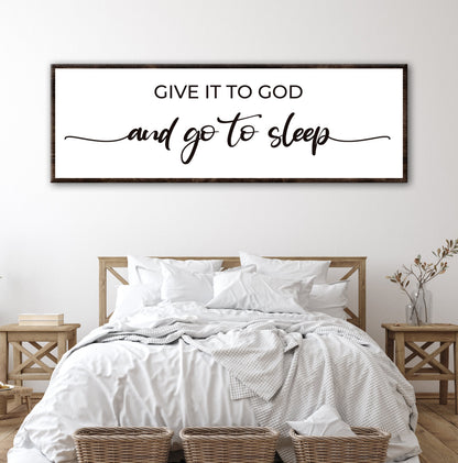 Tailored Canvases sign, white with black text in dark wood frame on Tampa Home & Garden Store