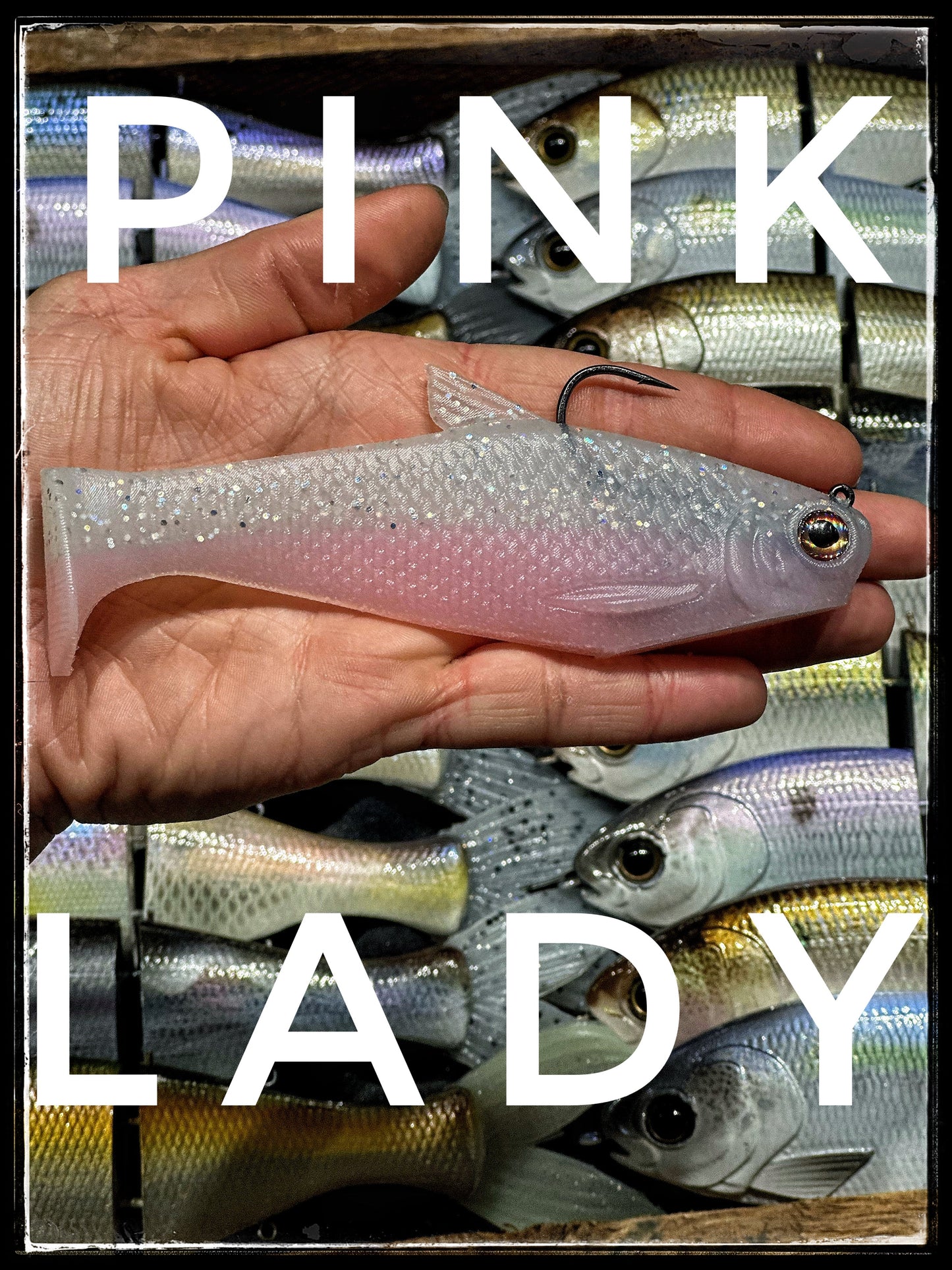 Bacca Burrito boot-tail soft swimbait by Bull Shad Swimbaits, translucent glitter white with pink tint on Tampa Home & Garden Store